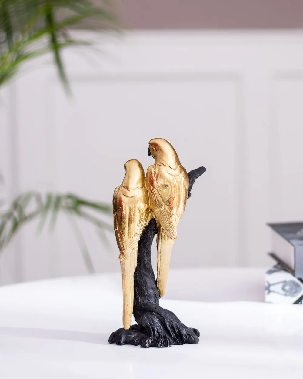 Black   Gold Parrot Figurine on a Branch