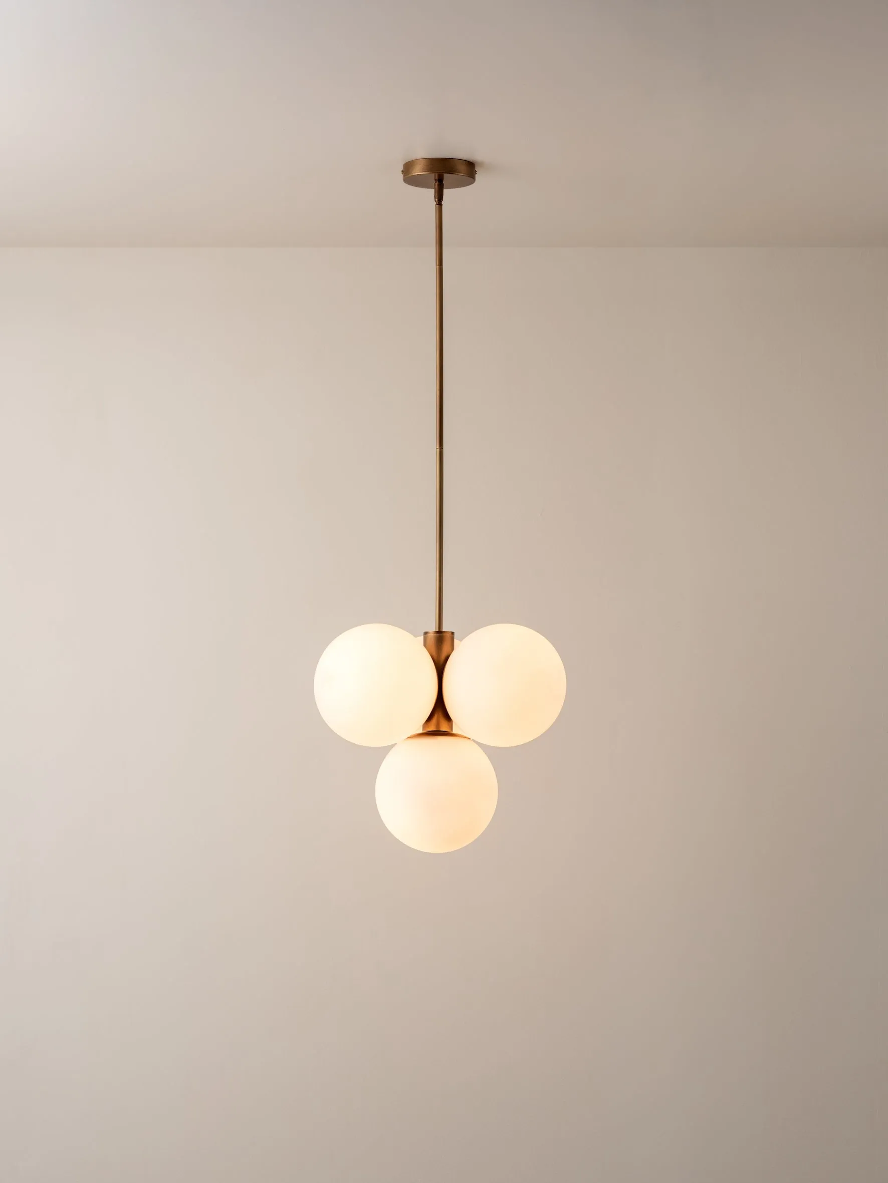 Boule - 4 light brass and opal pendant light