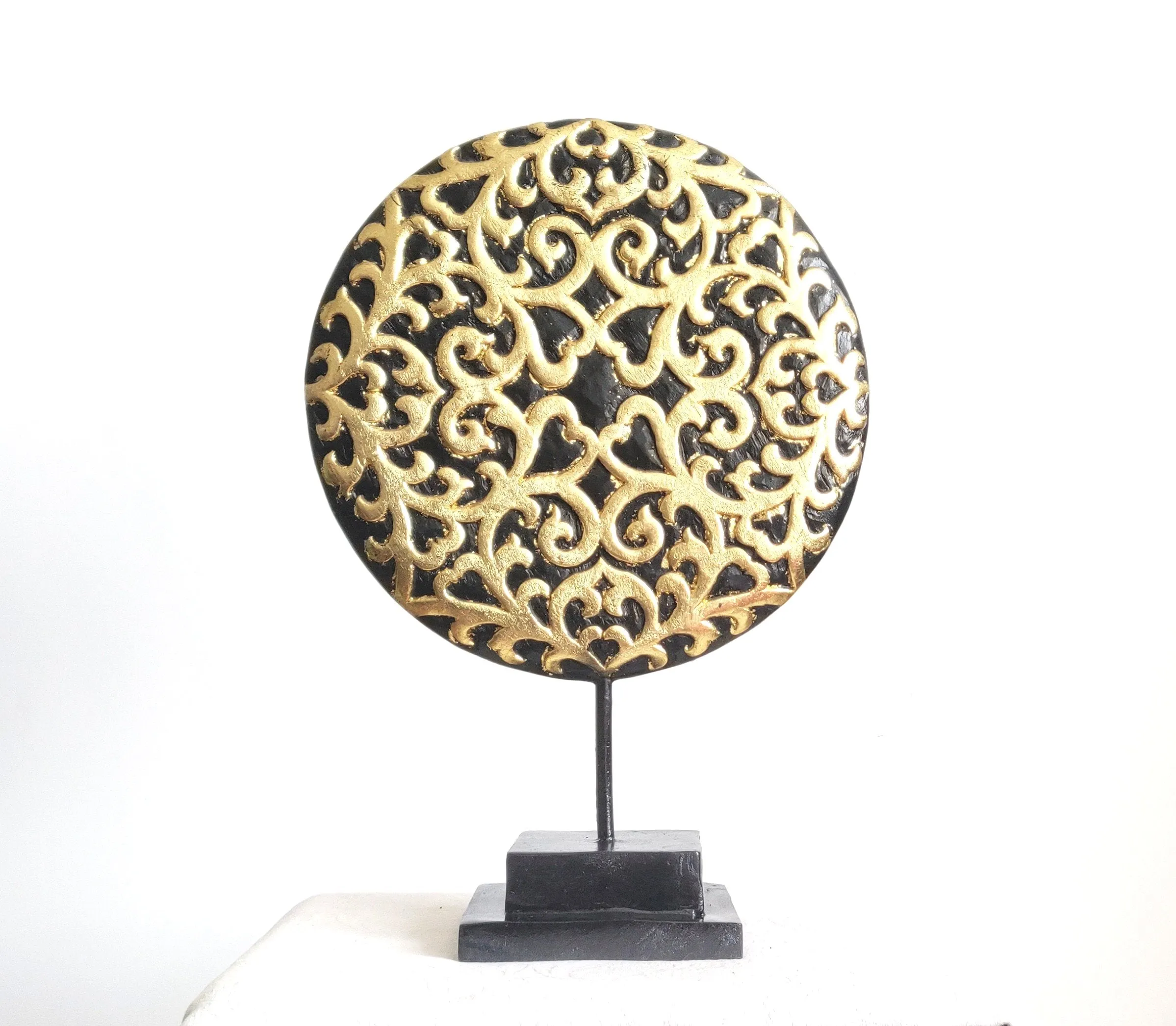 Home Decorations: Large Floral inspired beautiful Asian carved wooden disc mounted on a stand. H 54 cm