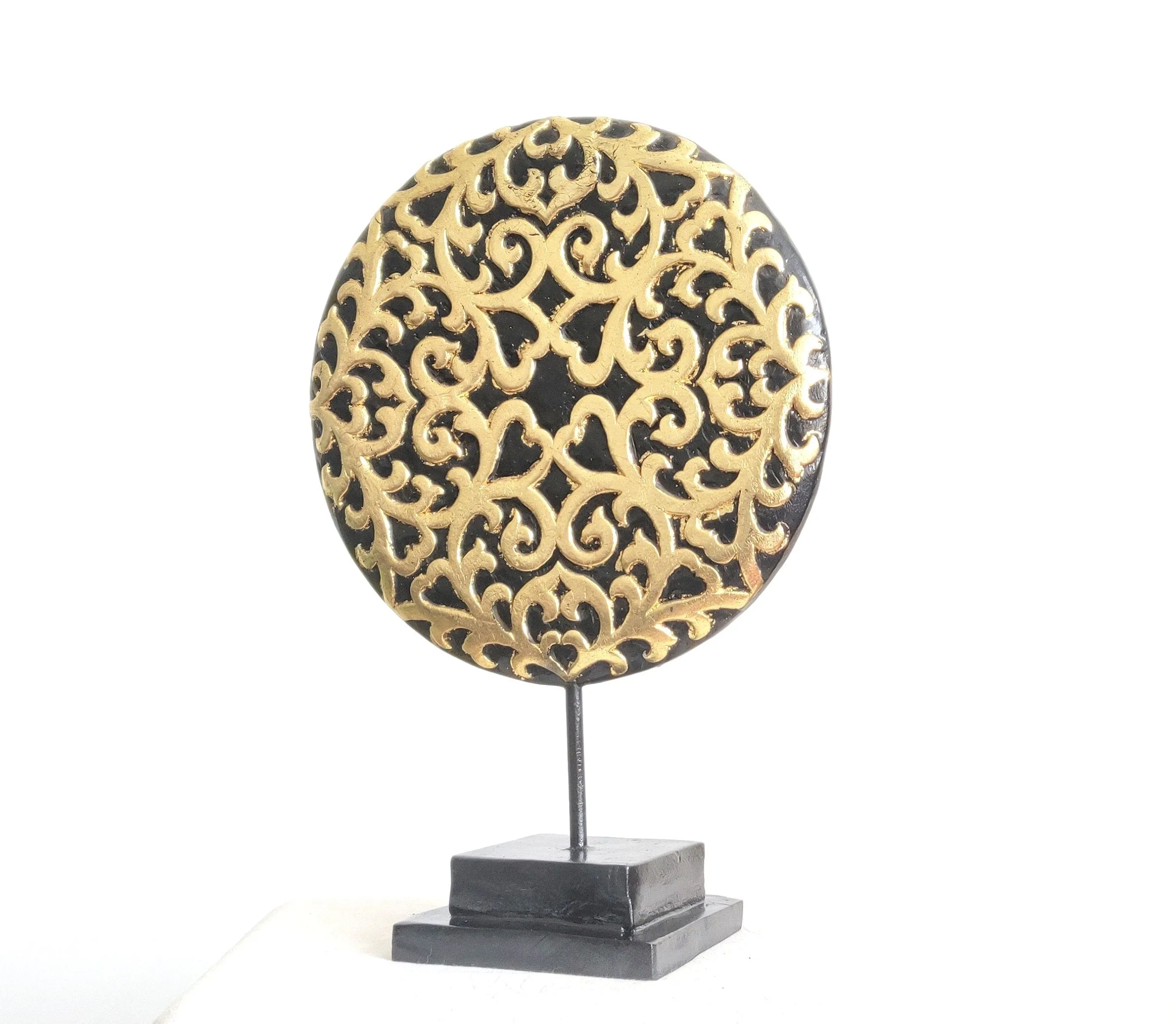 Home Decorations: Large Floral inspired beautiful Asian carved wooden disc mounted on a stand. H 54 cm