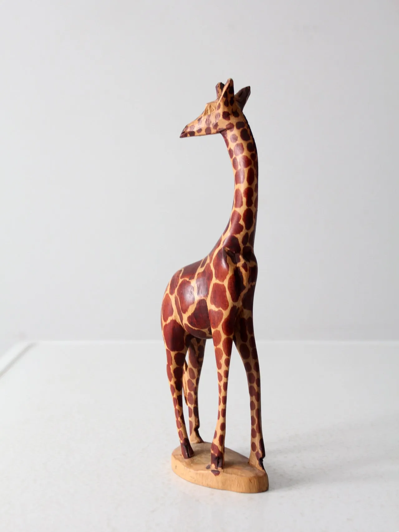 vintage wood carved giraffe